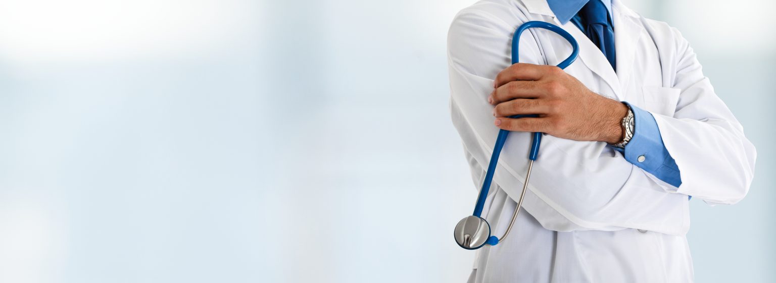 Doctor in front of a bright background